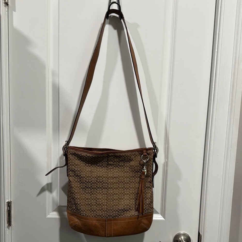 Coach Brown Crossbody Bag with Textured Fabric and Adjustable Strap